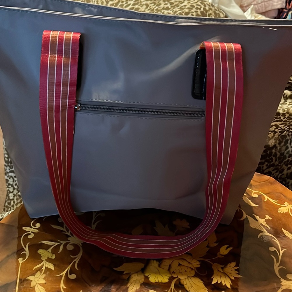 NWOT gray nylon tote bag with decorative straps